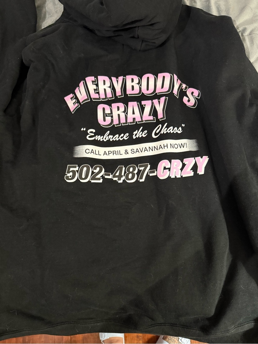 Everybody's Crazy Black Hoodie with Pink Graphic